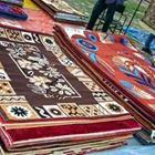 A bunch of different carpets